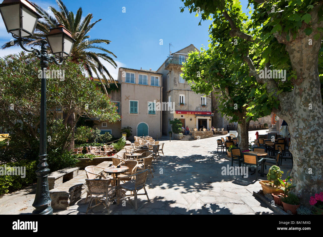 Cafes in the main square, Erbalunga, Cap Corse, Corsica, France Stock Photo