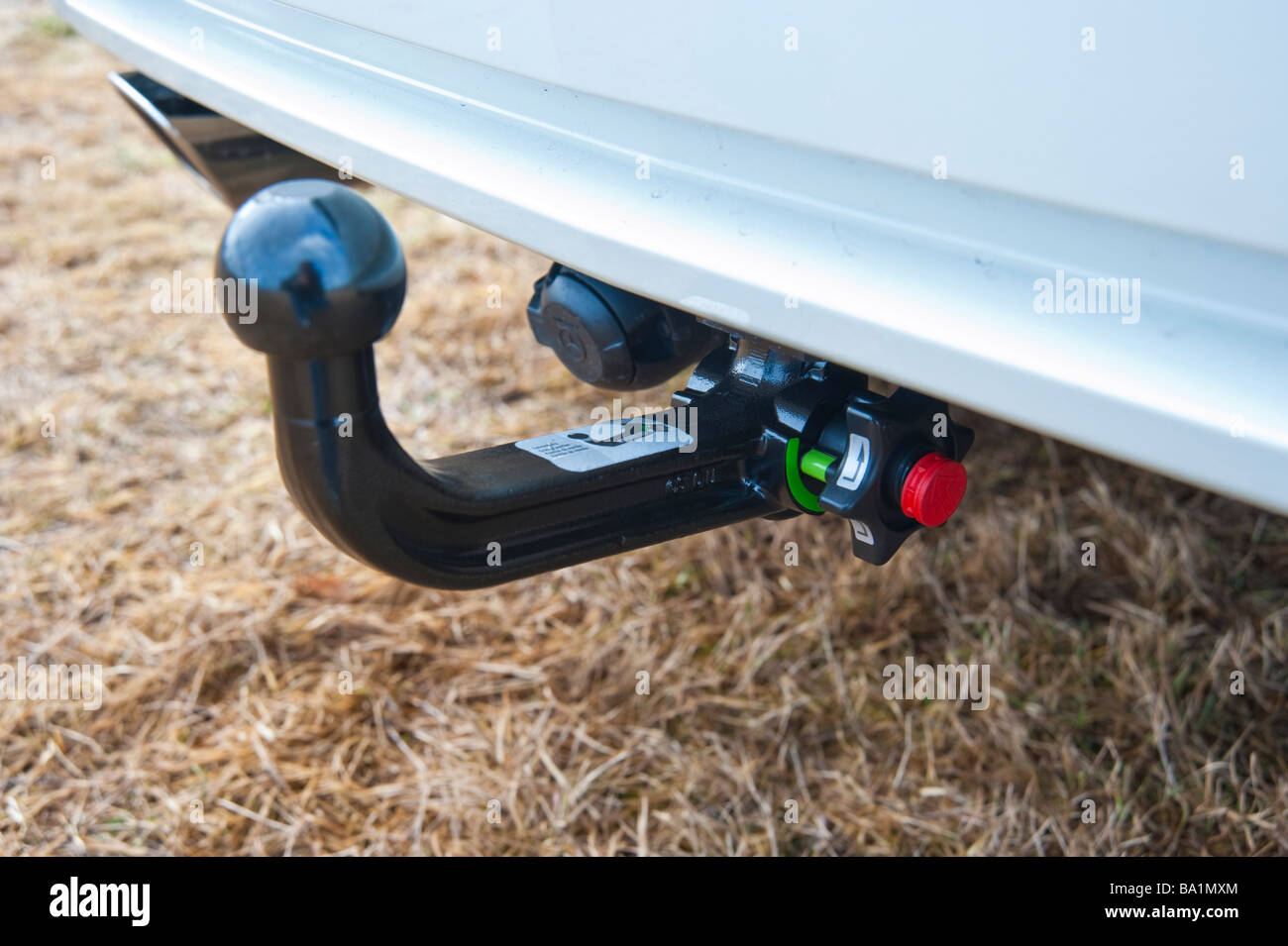 Detachable tow coupling on car | Abnehmbare Anängerkupplung am Auto Stock Photo