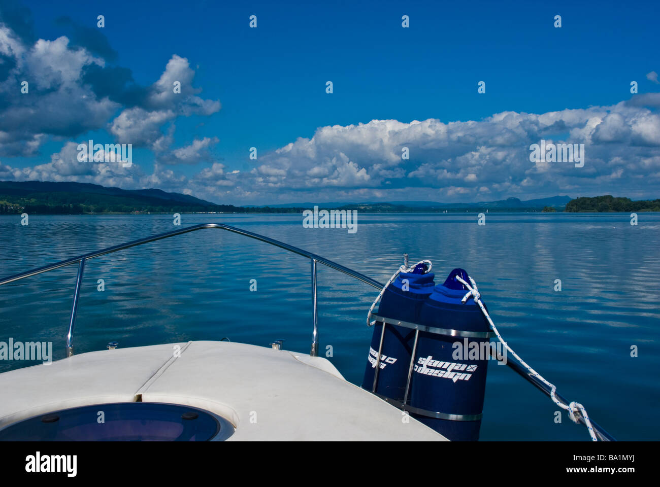 Bow of a powerboat on Lake Constance facing alp panorama Germany | Bug einer Motoryacht auf dem Bodensee mit Blick auf das Alpen Stock Photo