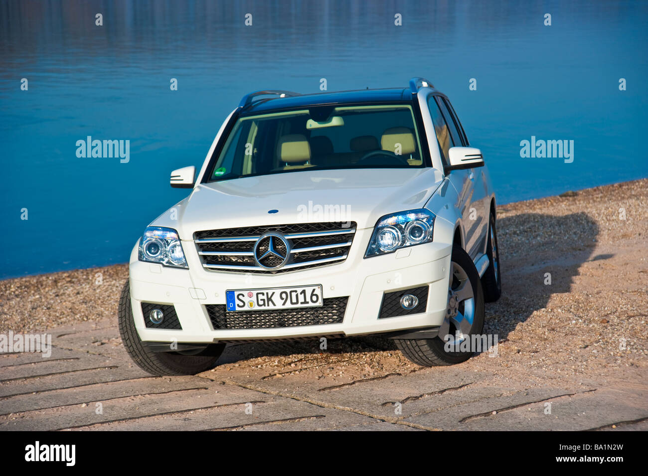 White Mercedes GLK in front of Rhine river | Weißer Mercedes GLK am Rheinufer Stock Photo