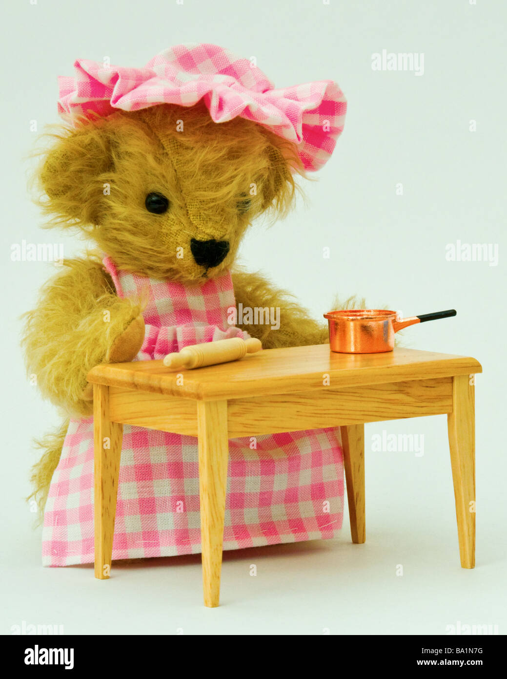 Miniature female teddy cook (Mini Bear Collection) Stock Photo
