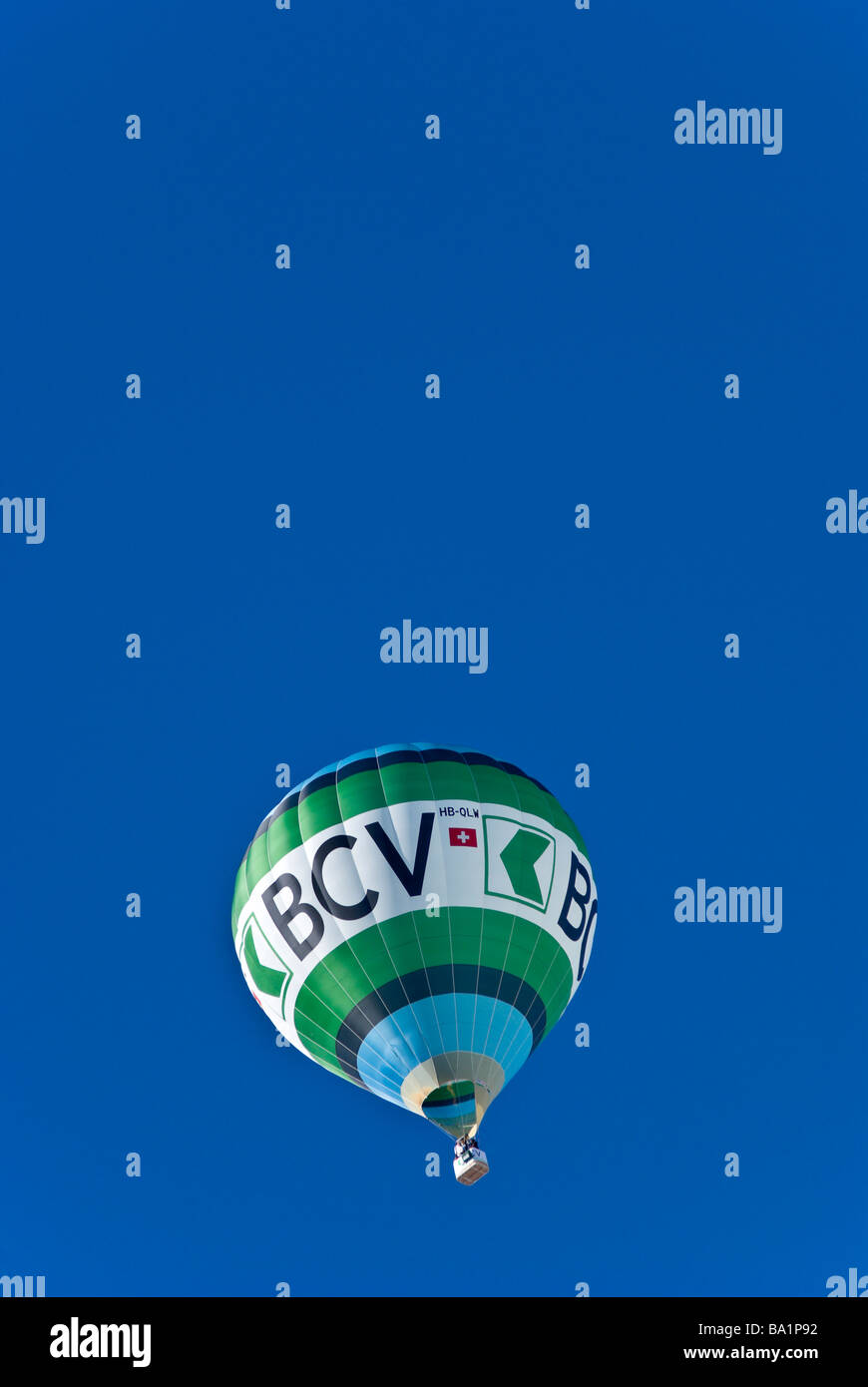 Banque Cantonal Vaud title sponsor balloon at the 2009 International Hot Air Balloon festival Chateau d'Oex Switzerland. Stock Photo