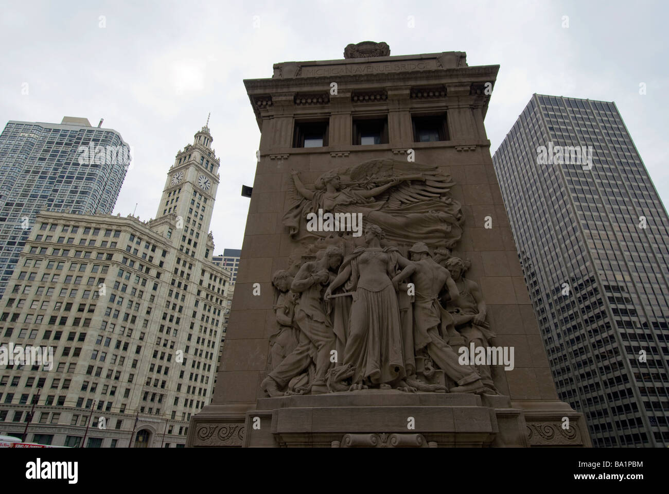 A 1923 monument  commemorating the regeneration of Chicago after the 1871 fire. Wrigley building is left. Stock Photo