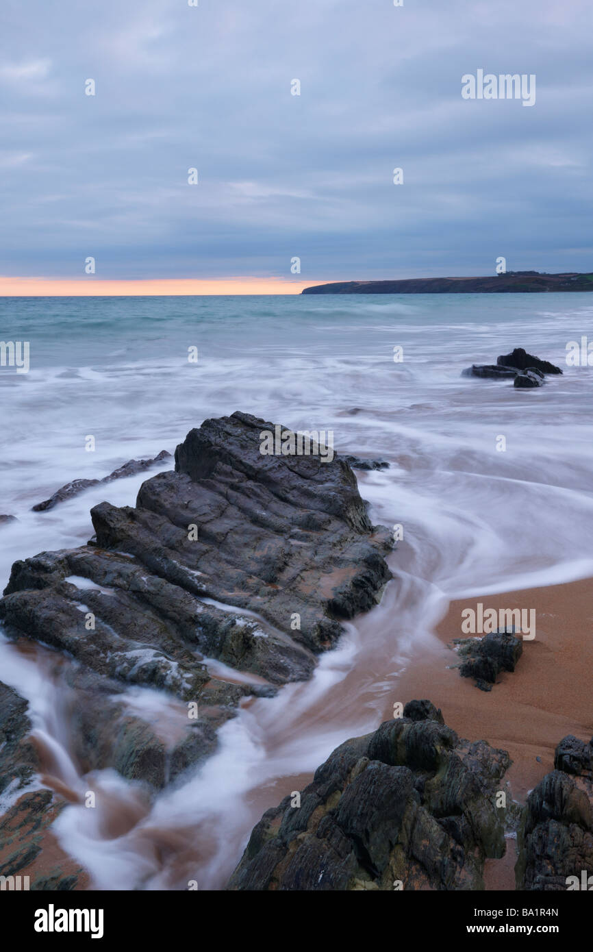 rocks and swirling water at Ballybrannigan Beach, Co.Cork, Ireland ...