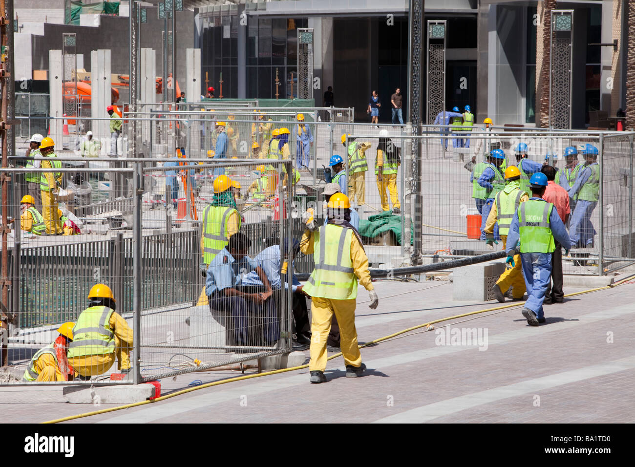 Construction workers working near the Burj Dubai in Dubai Stock Photo