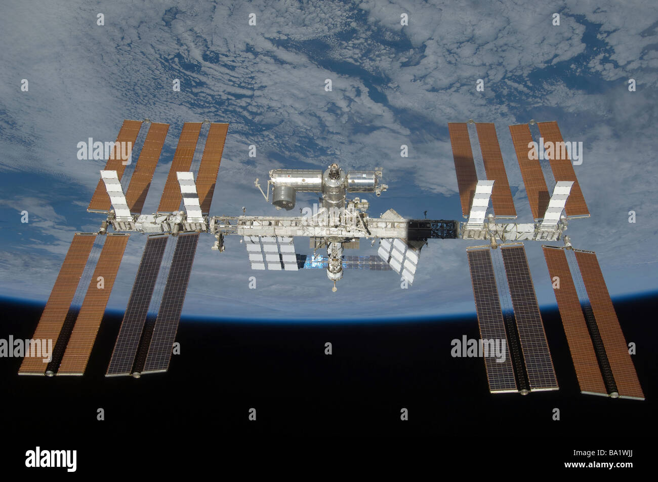 March 25, 2009 - The International Space Station, backdropped by the blackness of space and Earth's horizon. Stock Photo