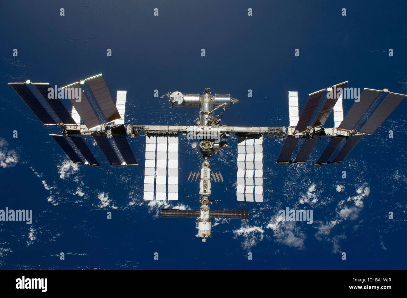 March 25, 2009 - The International Space Station, backdropped by a blue and white Earth. Stock Photo