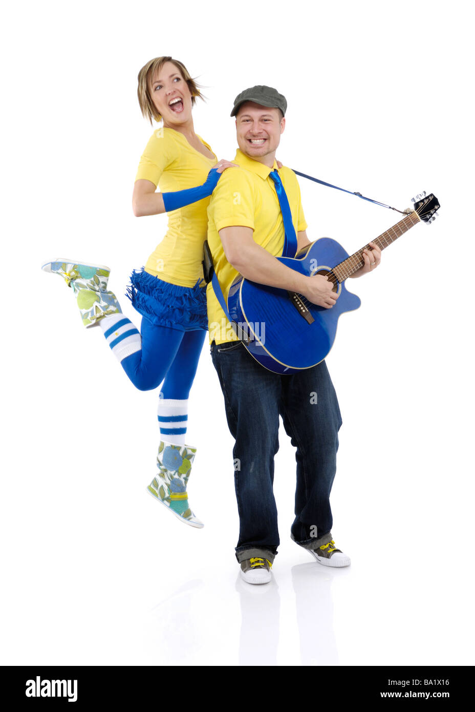 License available at MaximImages.com - Man playing the guitar and a woman dancing Stock Photo