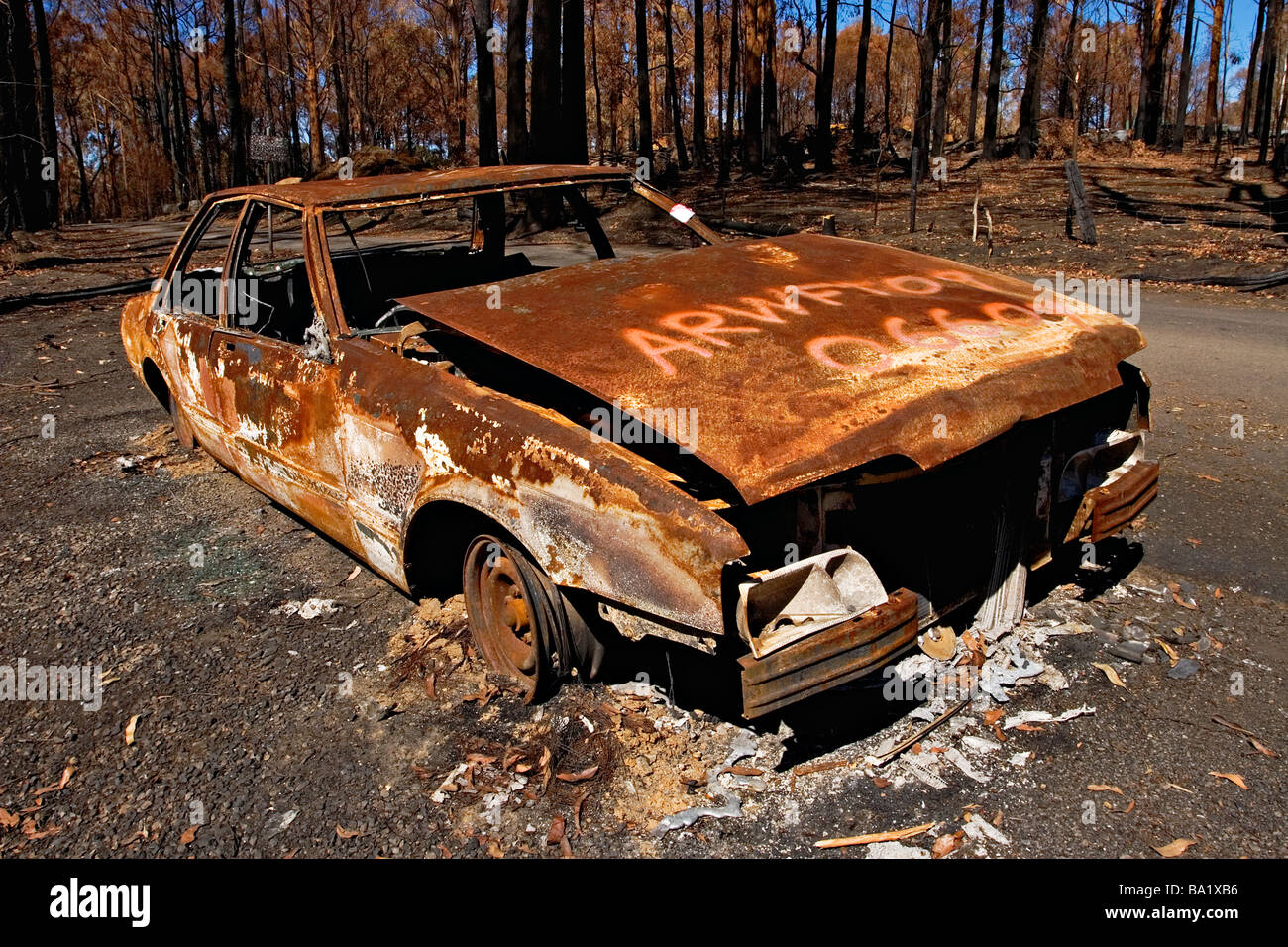 Bush Fires Australia / A burnt out motor vehicle in bushland.Kinglake Victoria Australia. Stock Photo