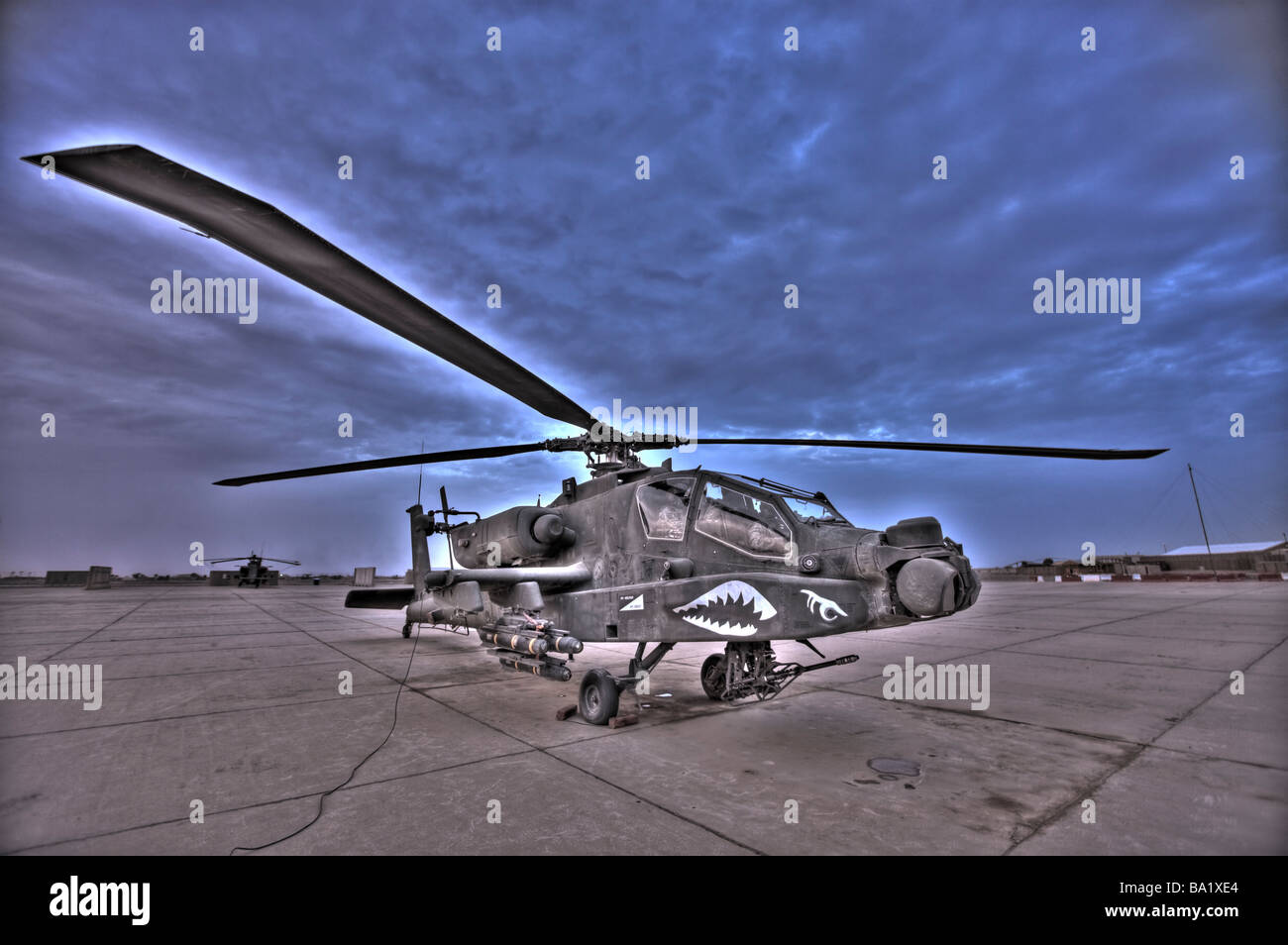 A seven exposure HDR image of a stationary AH-64D Apache helicopter. Stock Photo