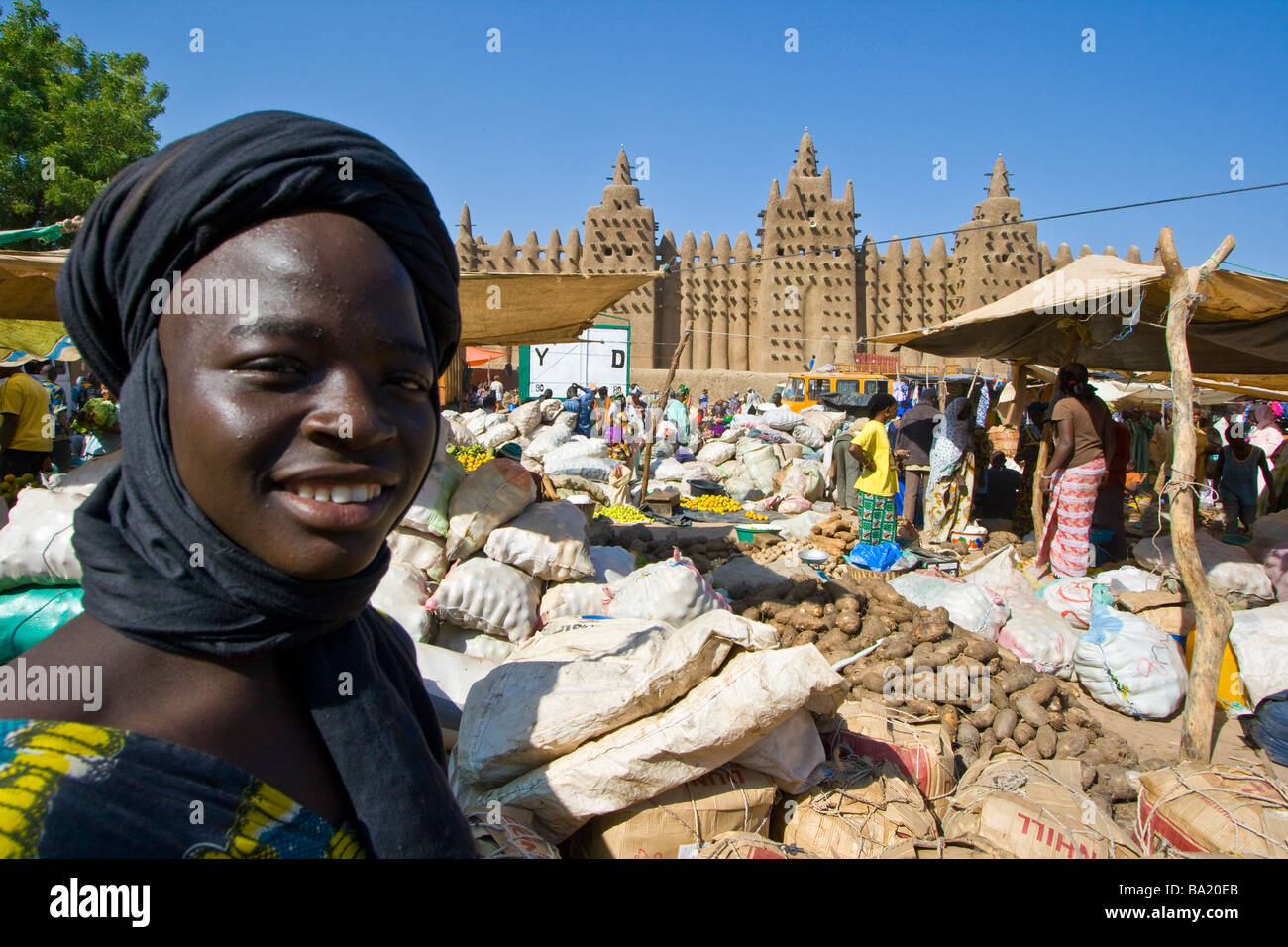 Malian Muslim Boy at the Monday Market in front of Great Mosque in Djenne Mali Stock Photo