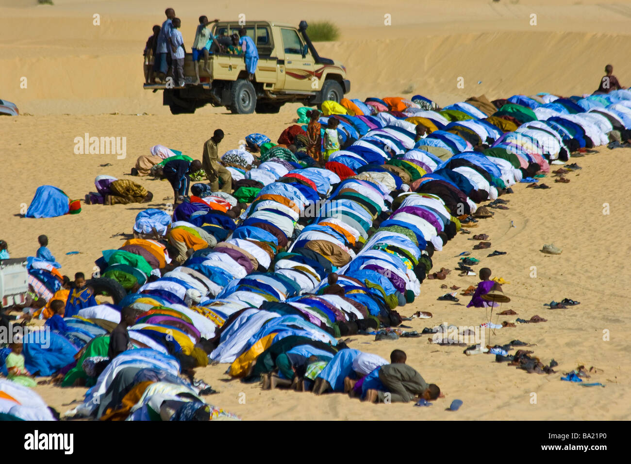 Muslim Prayer in the Desert during Tabaski in Timbuktu Mali Stock Photo