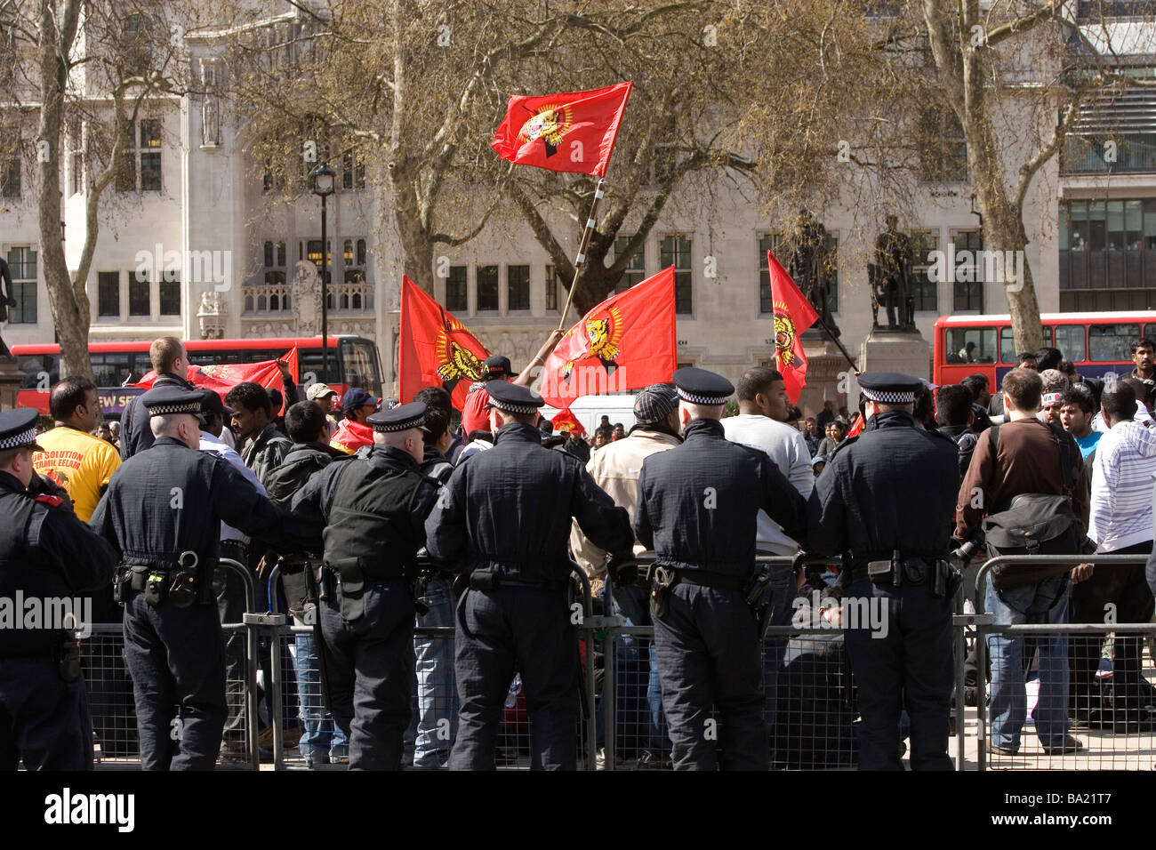 Police stand ready in parliament square as Sri Lankans demonstrate Stock Photo