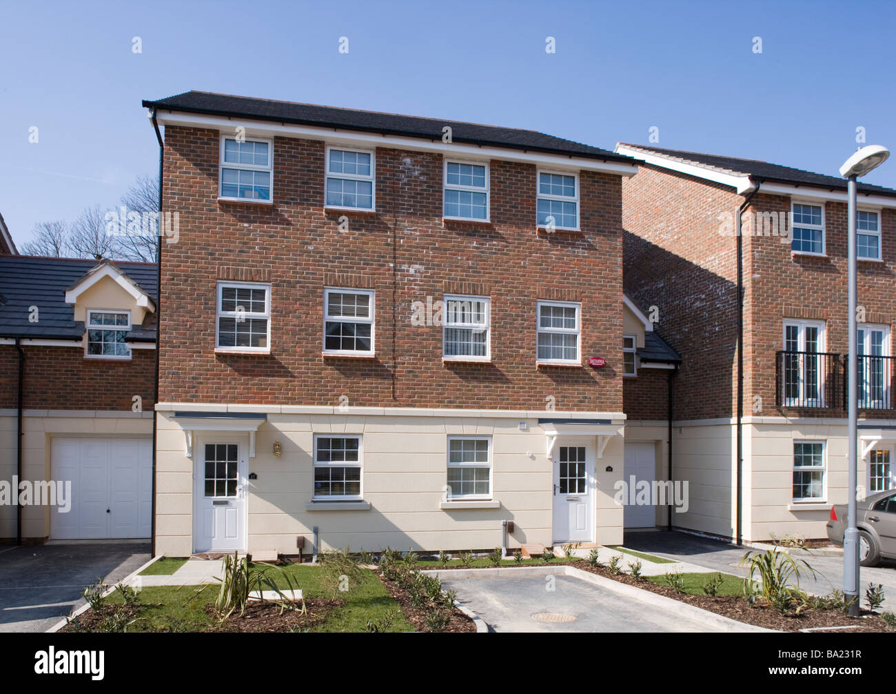 Modern detached house in residential street Sussex South East England ...