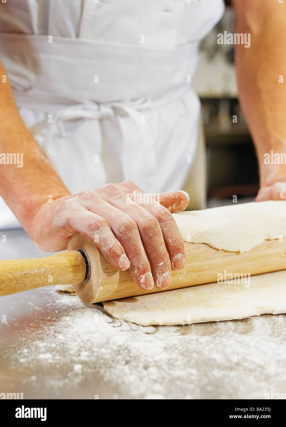Chef rolling out pastry Stock Photo Alamy