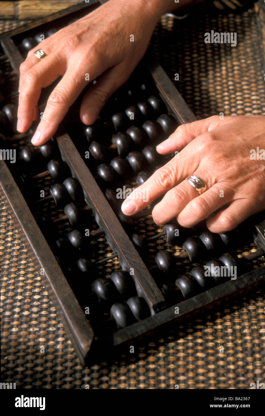 A wooden abacus or counting frame traditionally used in Asia Stock Photo