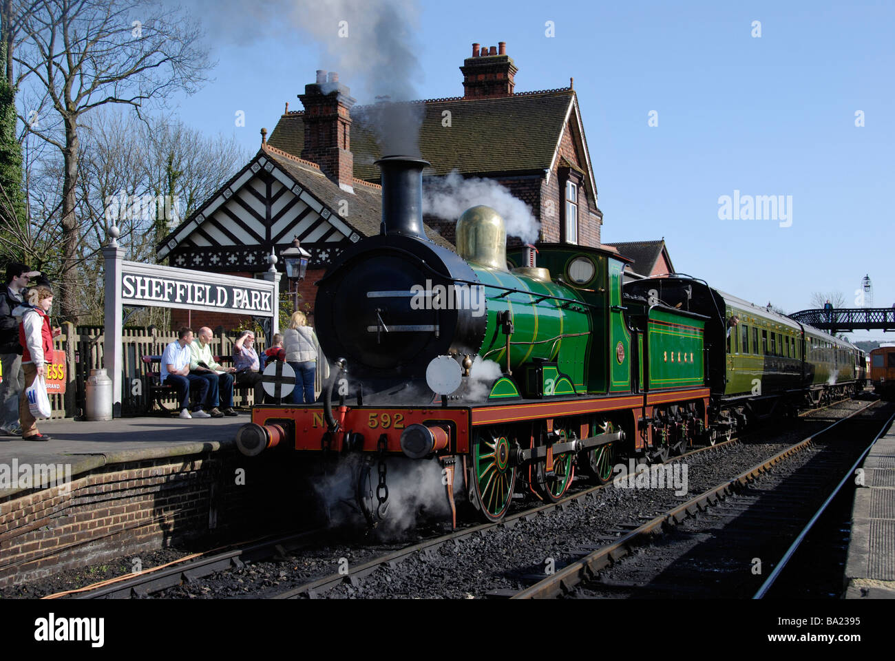 Wainwright C Class Locomotive No.592 waits to leave Sheffield Park Station on the Bluebell Railway in Sussex. Stock Photo