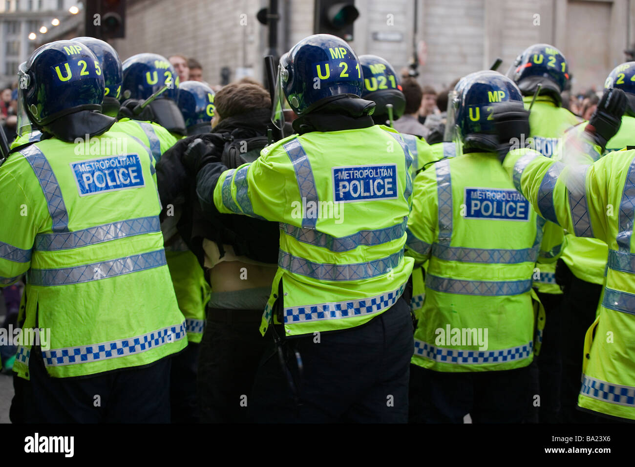 Line of police in partial riot gear during anti-capitalist demonstration against G20 summit in London, April 1 2009 Stock Photo