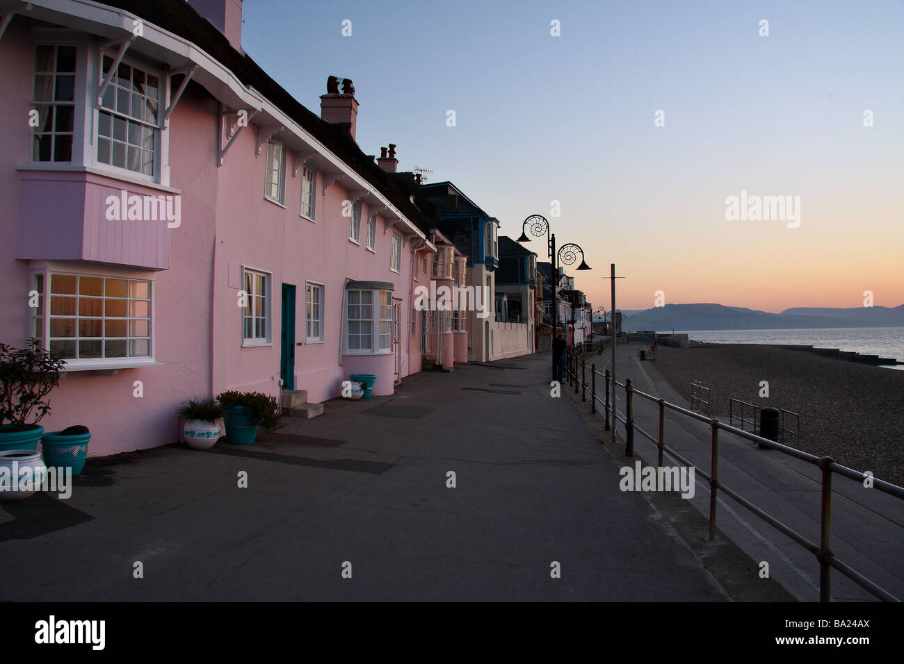 A view of the brightly painted houses on the Lyme Regis sea front at