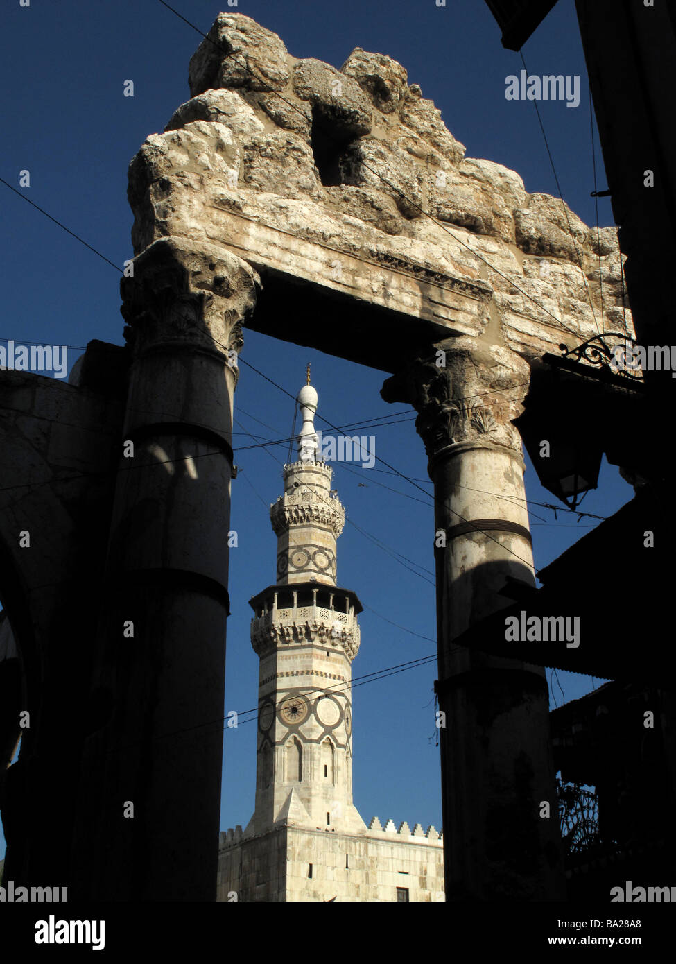 Great Umayyad or Omayyad Mosque minaret and Roman Temple of Jupiter Damascus SYRIA Stock Photo
