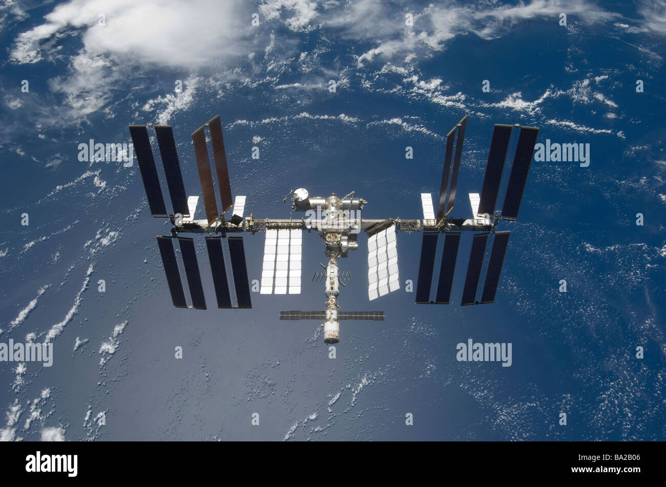 March 25, 2009 - The International Space Station, backdropped by a blue and white Earth. Stock Photo