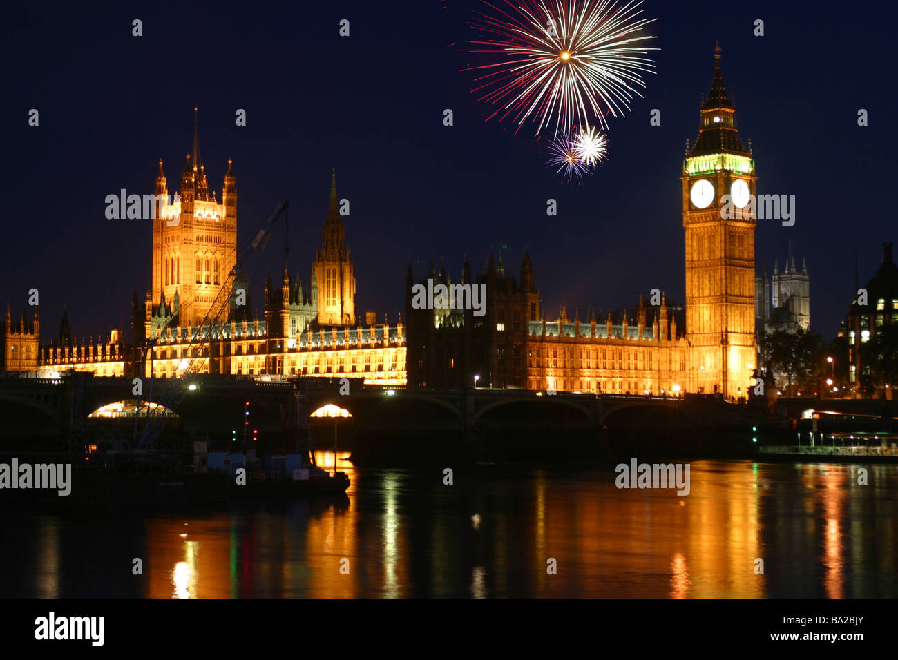 Fireworks New Year's eve Big Ben clock tower at night over tower bridge, London, England Stock Photo