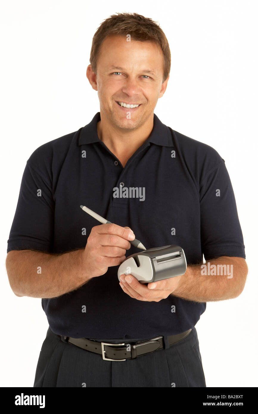 Courier Writing On An Electronic Clipboard, Smiling At The Camera Stock Photo