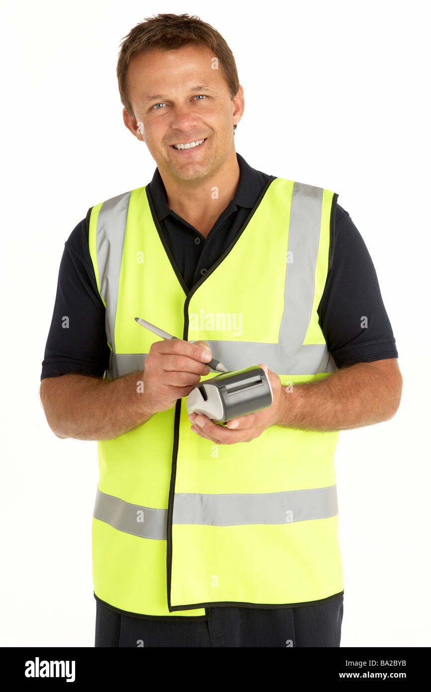 Courier Writing On An Electronic Clipboard, Smiling At The Camera Stock Photo