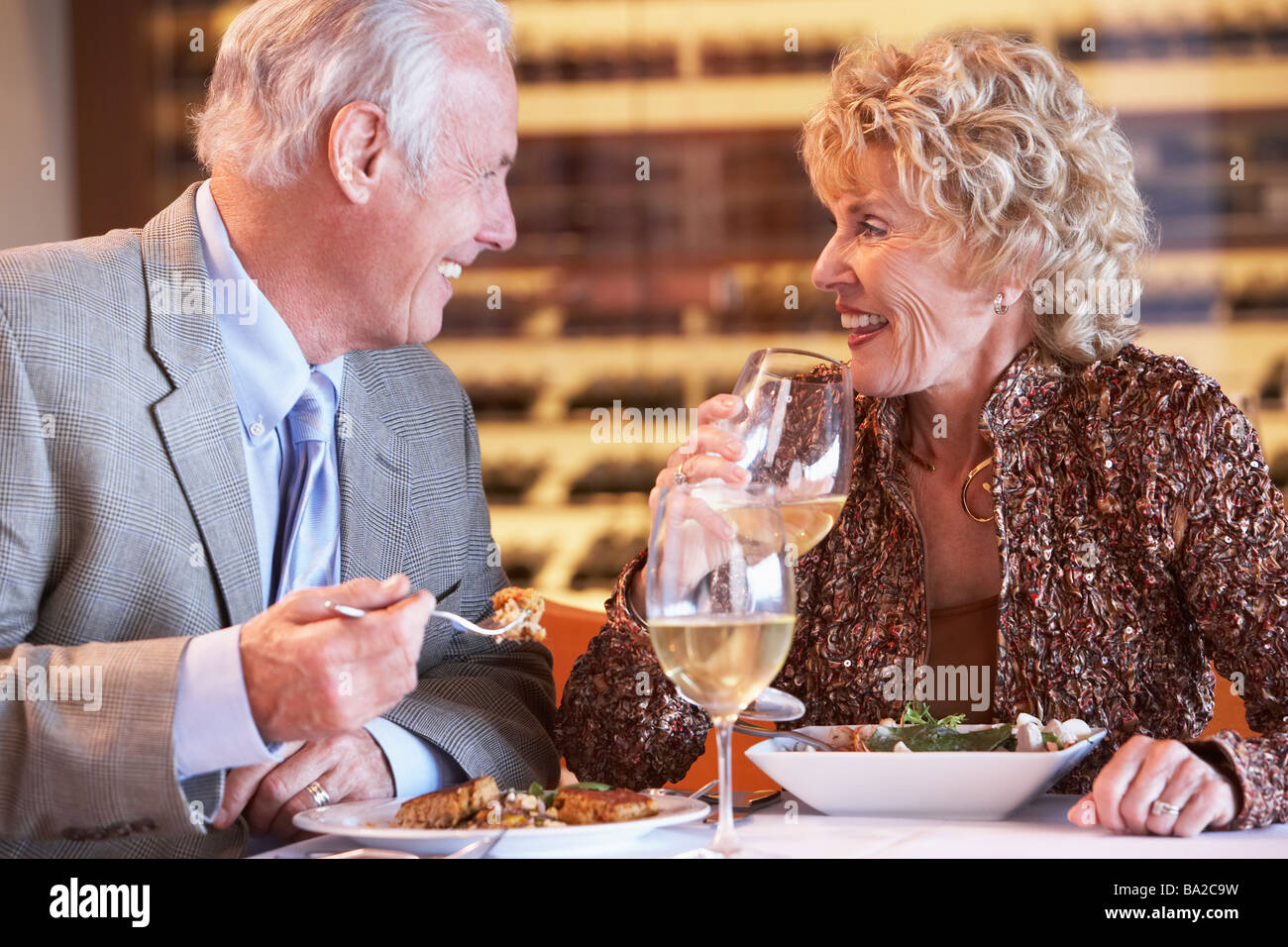 Senior Couple Having Dinner Together At A Restaurant Stock Photo - Alamy