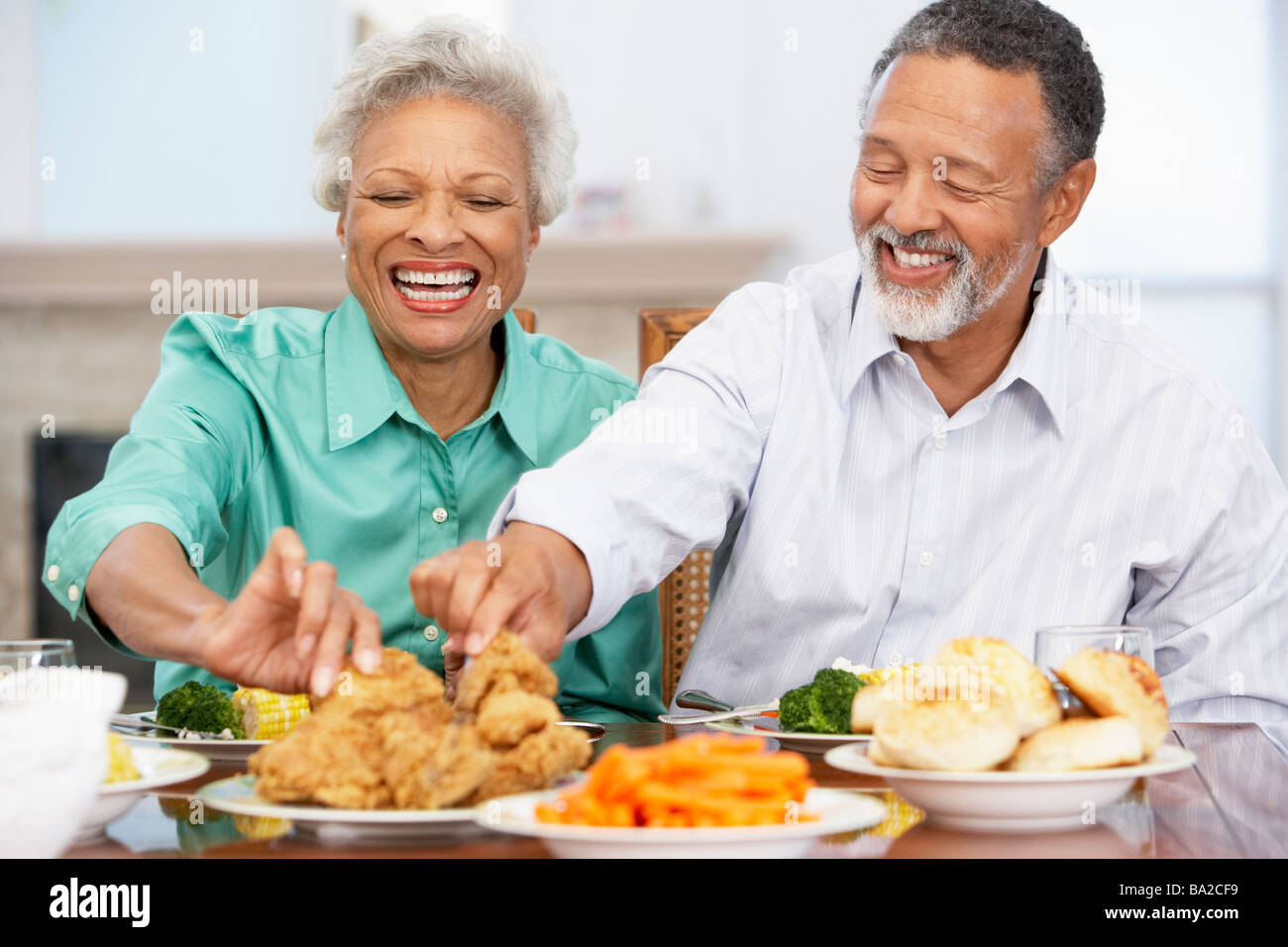 Senior man and woman having dinner home hi-res stock photography and ...