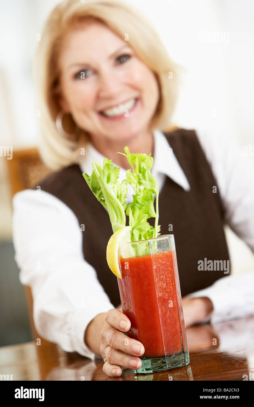 Woman Drinking A Bloody Mary Stock Photo