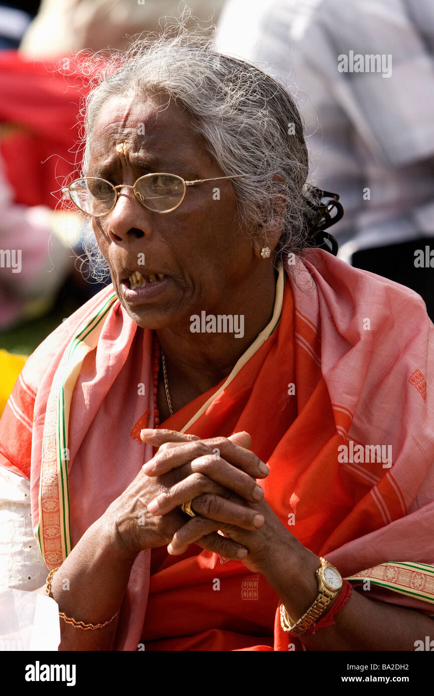 Sri Lankan old woman protests in Parliament Square demonstrating against their government s actions in Sri Lanka Stock Photo