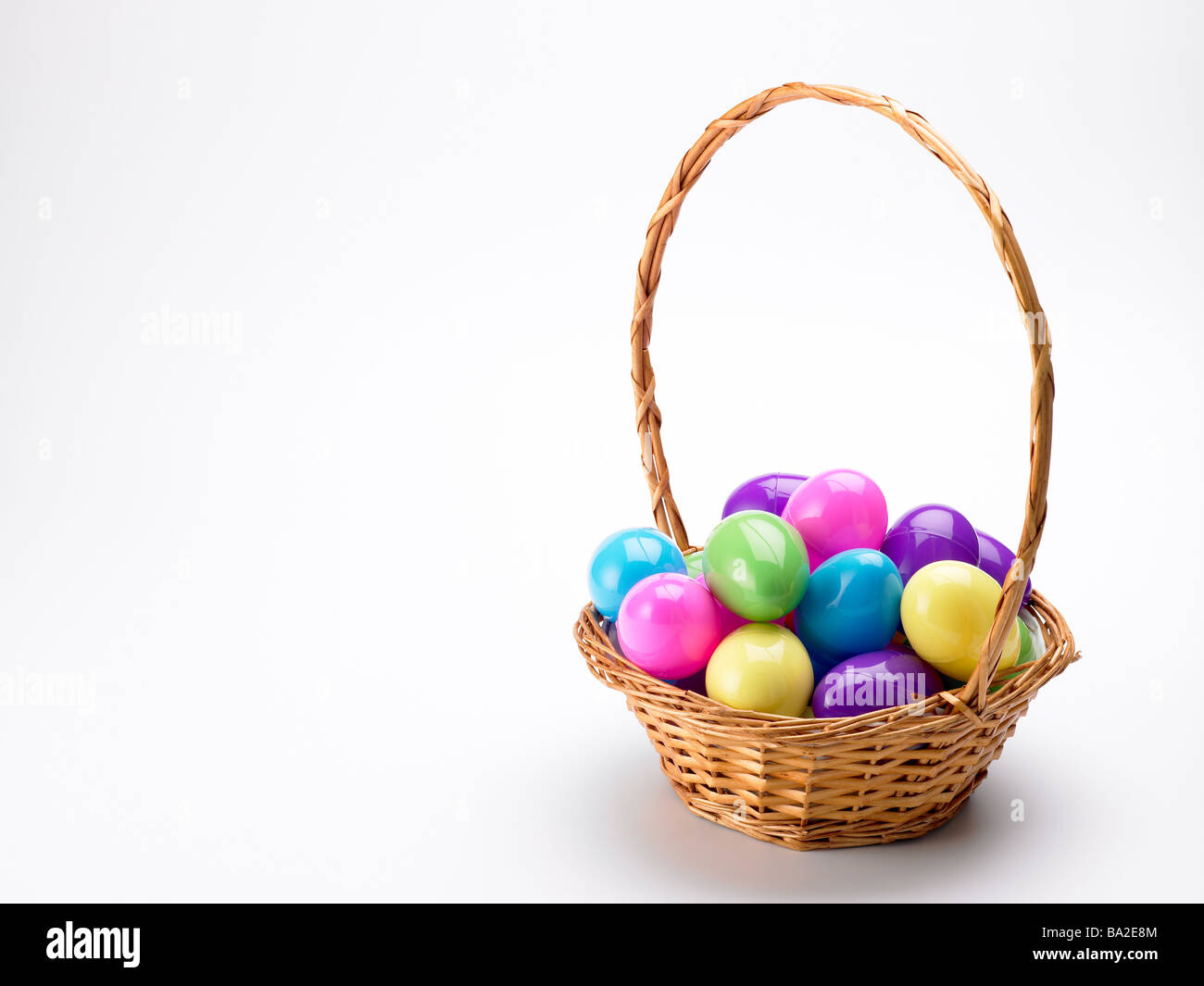 Basket Of Colorful Easter Eggs Stock Photo - Alamy