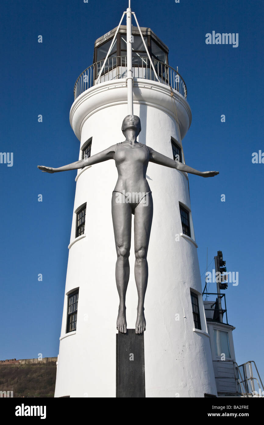 Sculpture of Diving Belle in front of Scarborough lighthouse Stock Photo