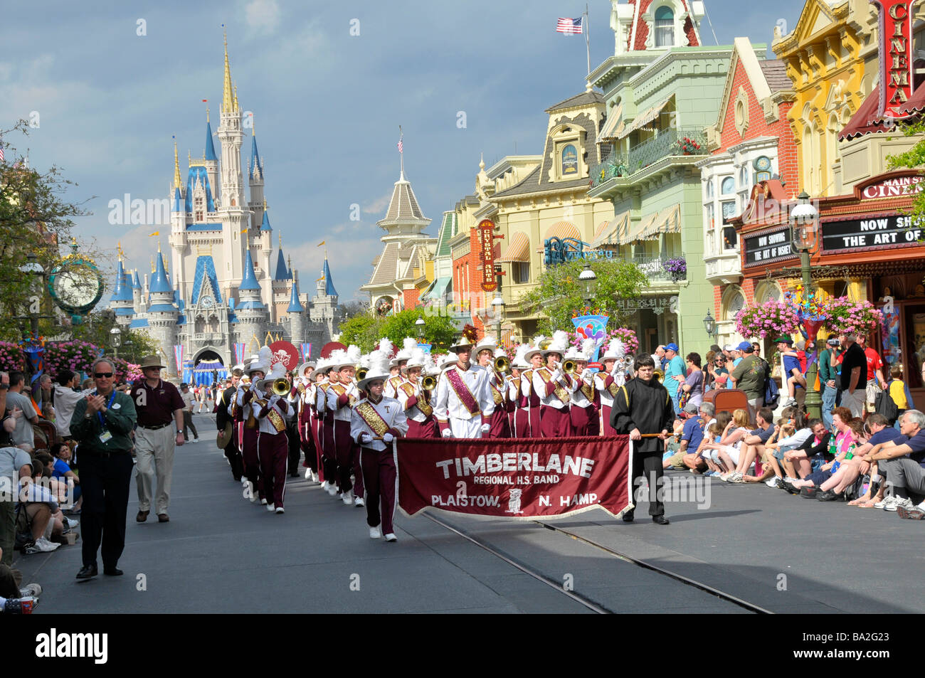 High School Band in Parade at Walt Disney Magic Kingdom Theme Park Orlando Florida Central Stock Photo