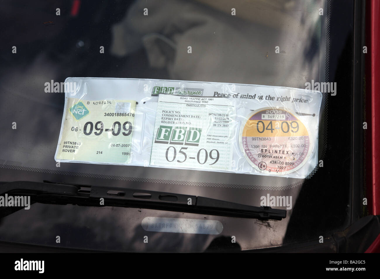 Irish car tax disk and insurance details posted on the windshield Stock Photo: 23413717 - Alamy