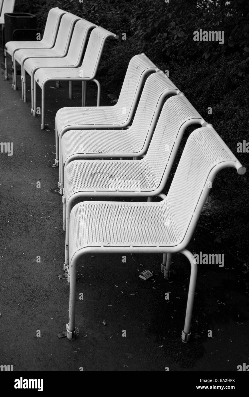 Park chairs s/w park wayside park-benches seat publicly strung pause rest empty rests dismal human-empty nobody loneliness Stock Photo