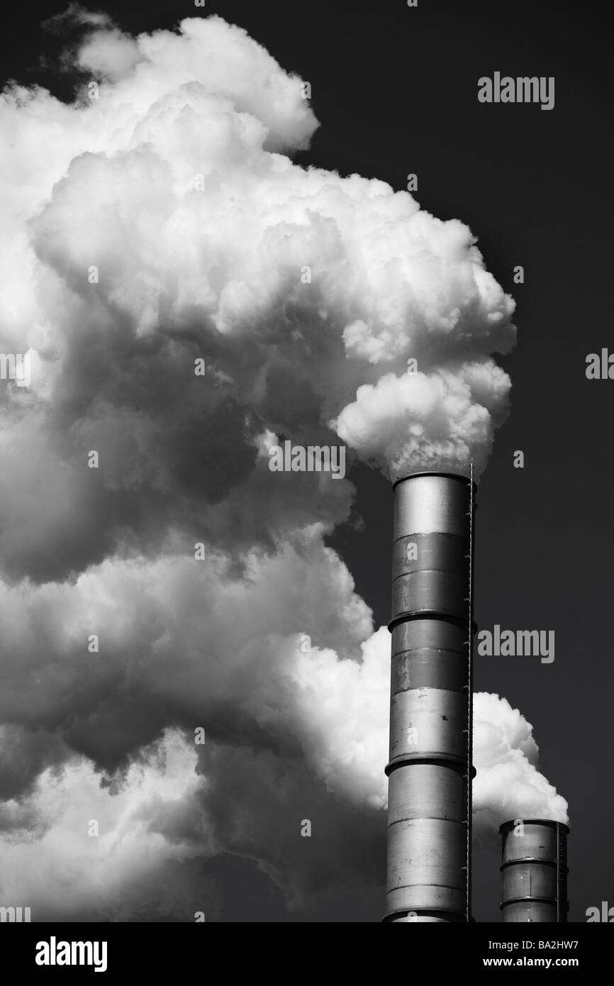 Factory-chimneys clouds of smoke heavens s/w industry industry-installation industrialization economy factory power plant Stock Photo