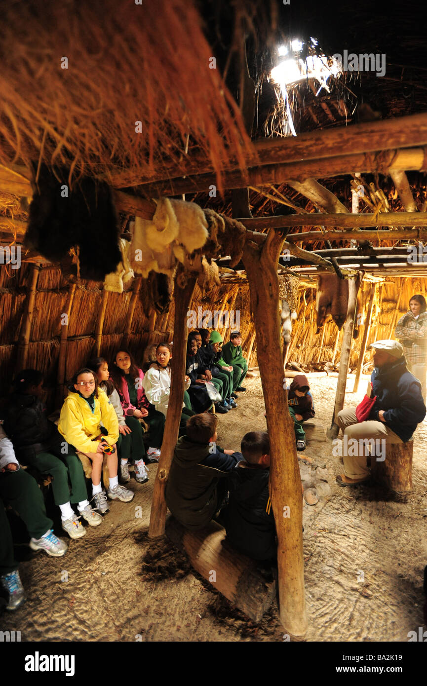 USA Maryland historic St Marys City MD Yaocomaco Indian village 4th grade class in a witchott house Stock Photo