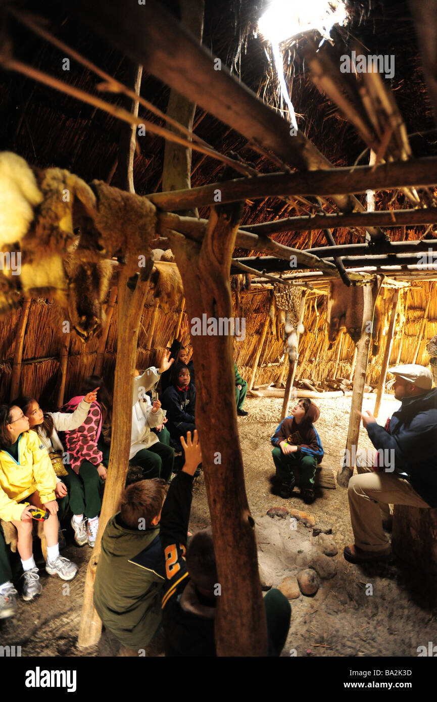 USA Maryland historic St Marys City MD Yaocomaco Indian village 4th grade class in a witchott house Stock Photo