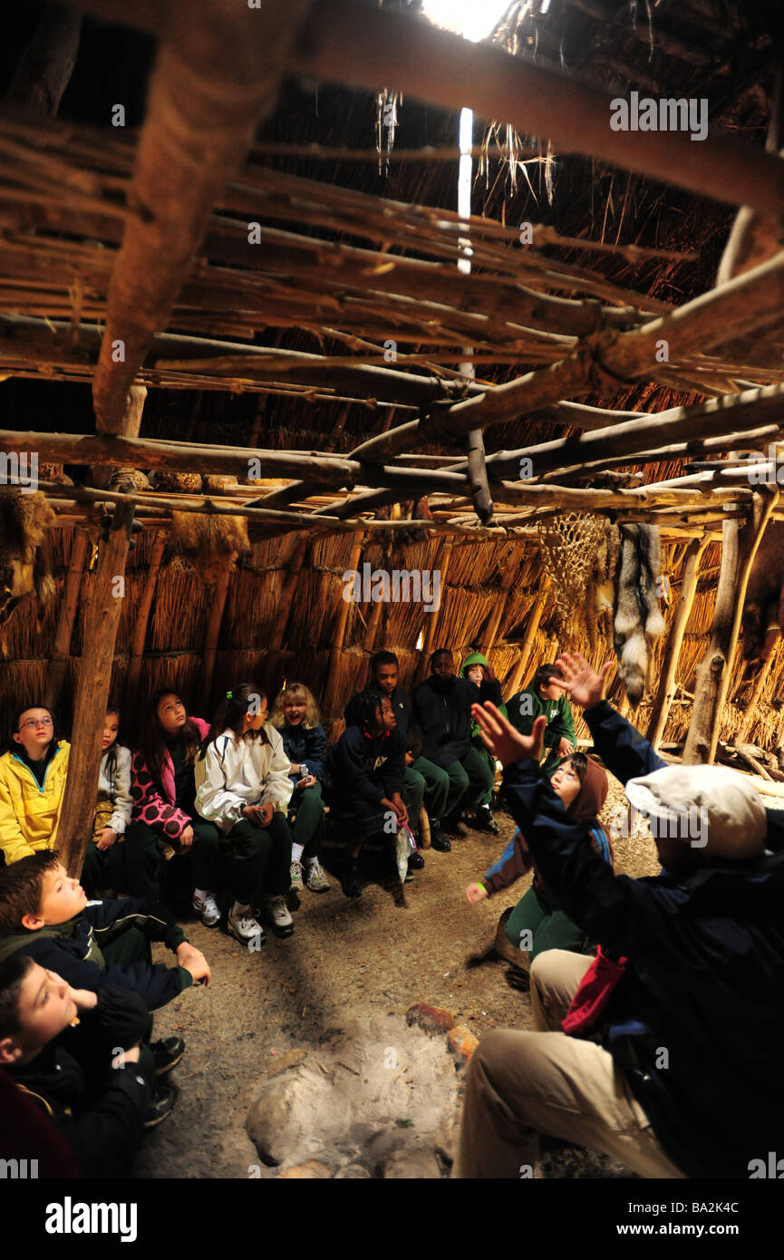 USA Maryland historic St Marys City MD Yaocomaco Indian village 4th grade class in a witchott house Stock Photo