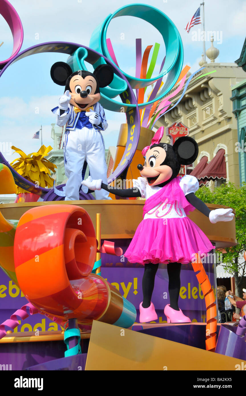 Mickey Mouse and Minnie Mouse on Float in Parade at Walt Disney Magic Kingdom Theme Park Orlando Florida Central Stock Photo