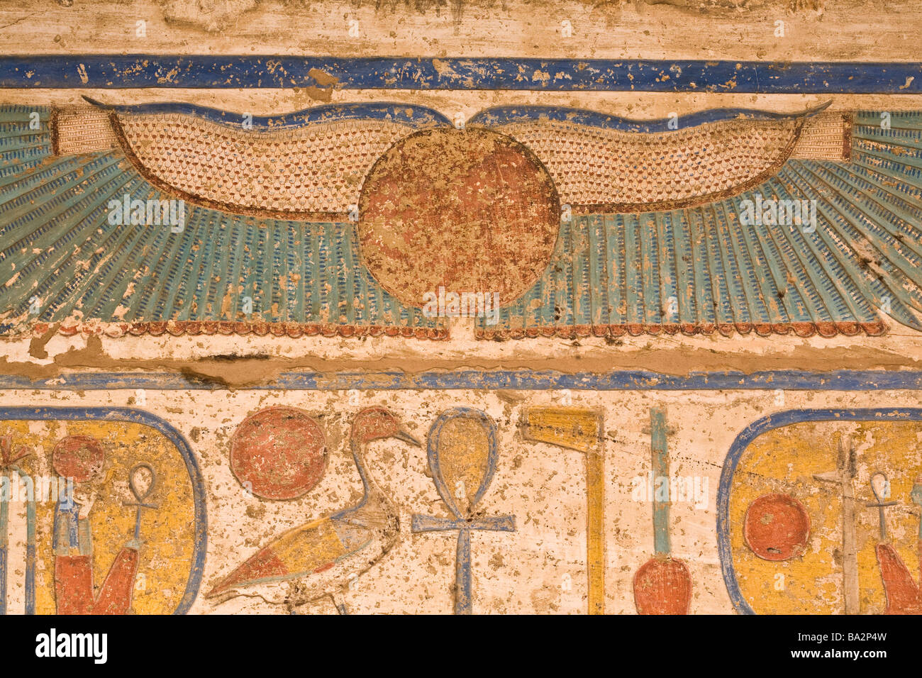 Painted reliefs on ceiling of second court at Medinet Habu , Mortuary Temple of Ramesses III, West bank of Nile, Luxor, Egypt Stock Photo