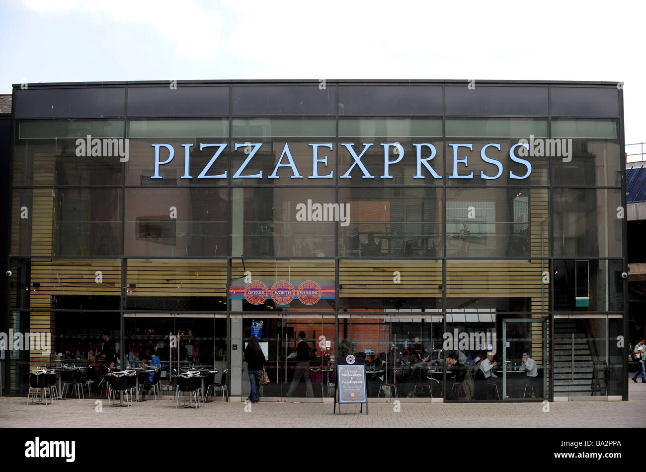 The glass front of a pizza express restaurant in brighton's jubilee square Stock Photo