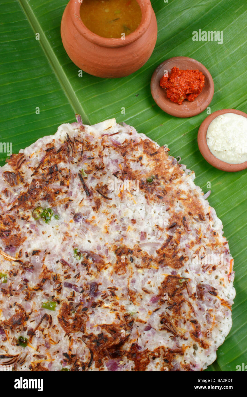Onion Dosa is a typical South Indian Pancake and served with chutney