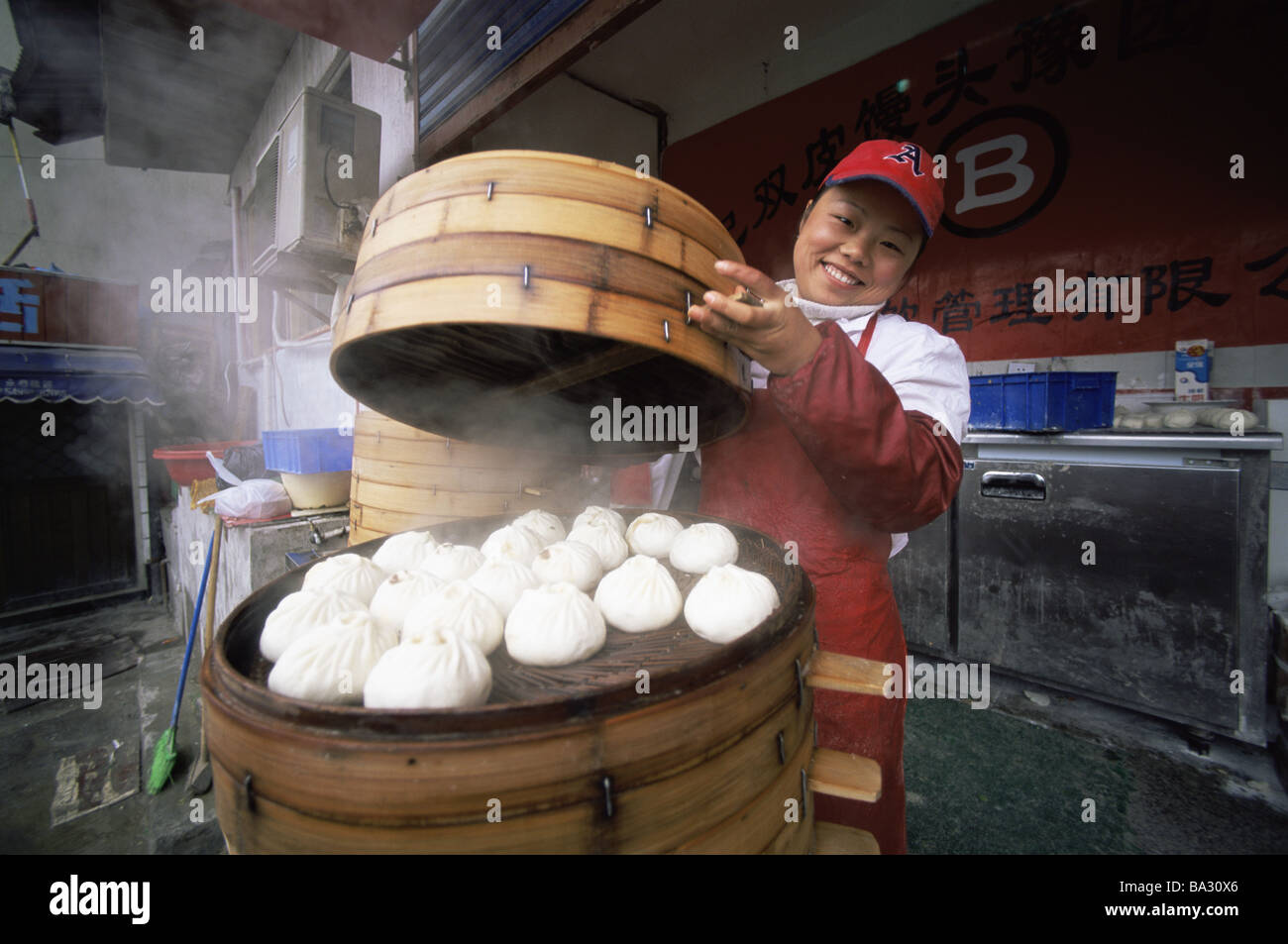 China Shanghai street-sales associate smiles dumplings muffles no models Eastern Asia city destination sight release Asia Stock Photo