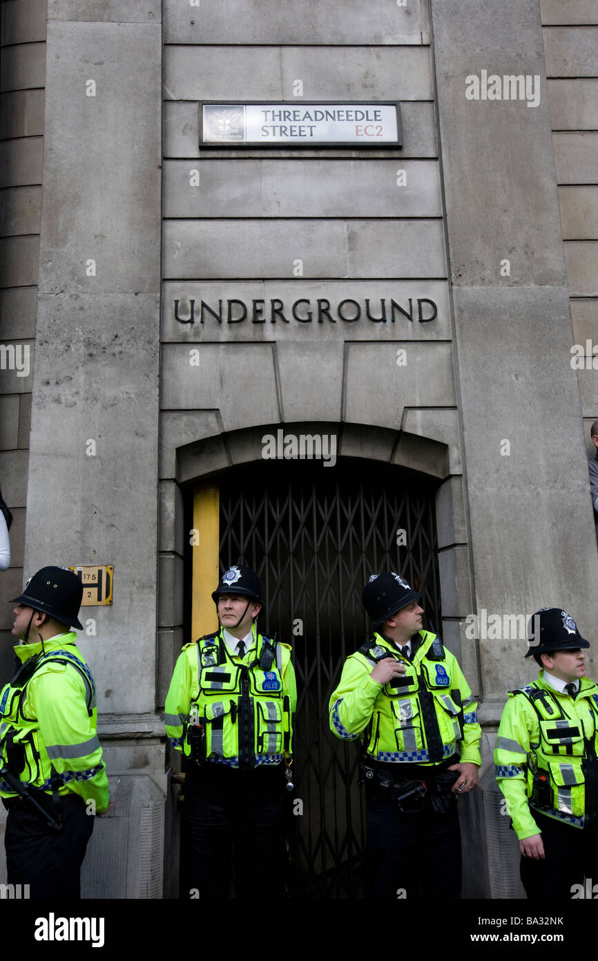 Police block the closed entrance to Bank underground station during the G20 protest at the Bank of England. Stock Photo
