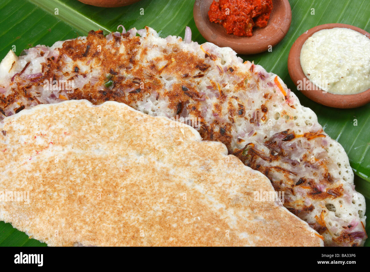 Onion Dosa is a typical South Indian Pancake and served with chutney