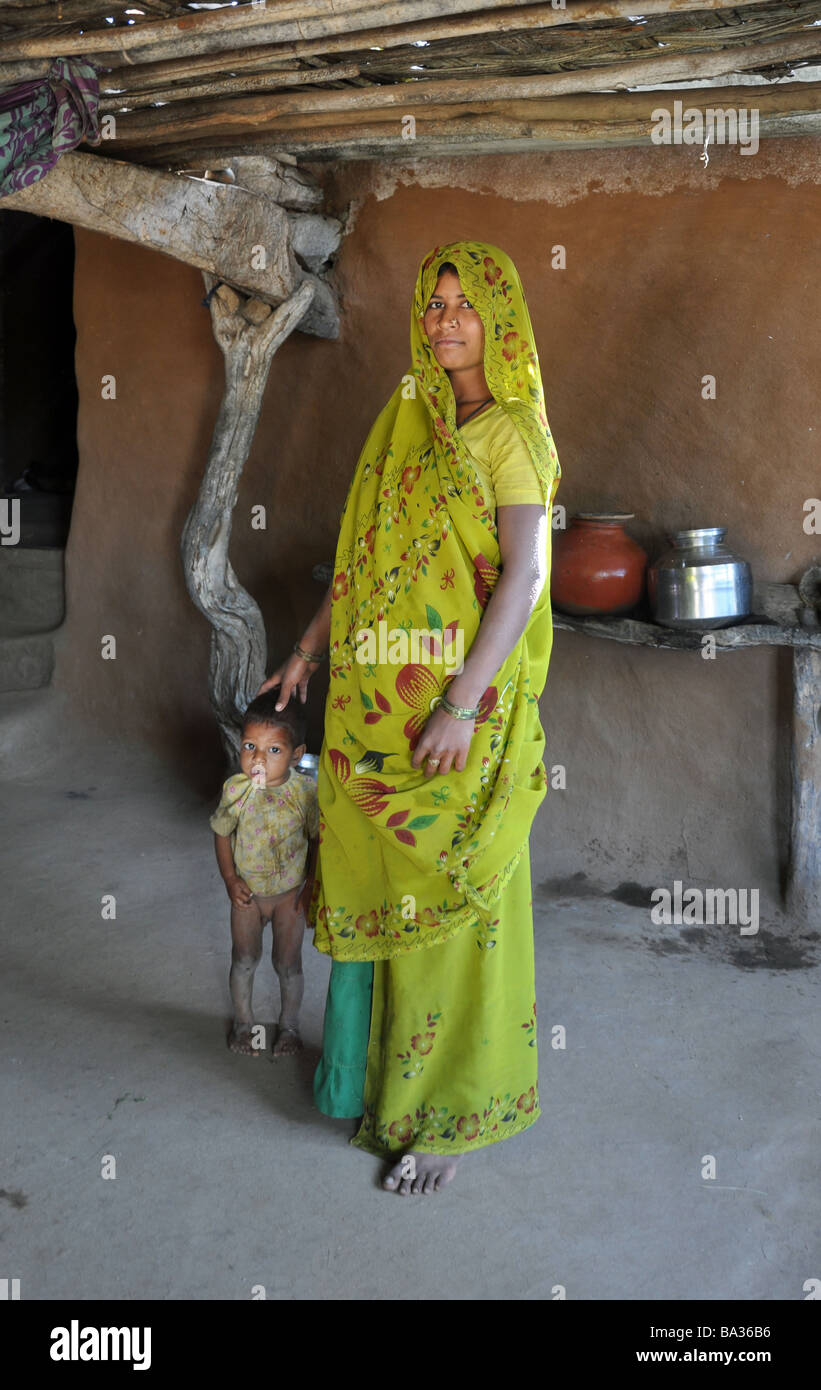 A mother and child at home. The Bhil Tribe, Gujarat Stock Photo