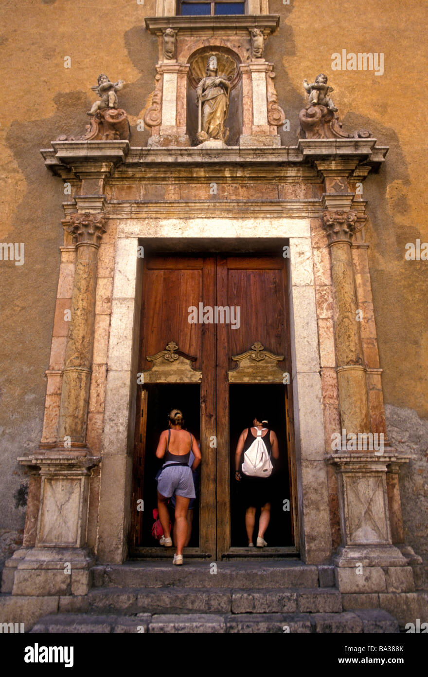 women, tourists, visitors, visiting, Saint Catherine Church, place of worship, house of worship,Taormina, Messina Province, Sicily, Italy, Europe Stock Photo